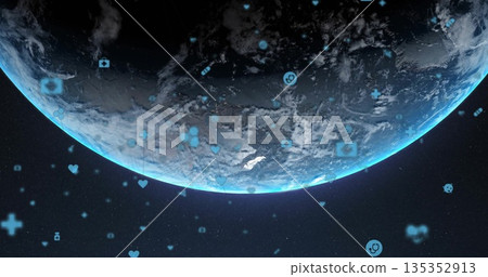 Displaying 3D Earth globe rotating at space horizon, with blue health and tech icons floating Displaying 3D Earth globe rotating at space horizon, with blue health and tech icons floating 135352913