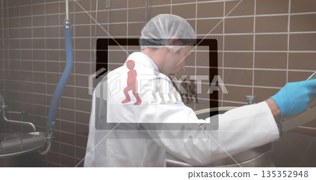 Sampling mixture in steel vat, gloved technician wearing lab coat in facility, with digital overlay Sampling mixture in steel vat, gloved technician wearing lab coat in facility, with digital overlay 135352948