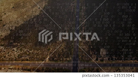 Displaying aerial view of crossing paved roads over remote desert, with shrubs, grass, binary code Displaying aerial view of crossing paved roads over remote desert, with shrubs, grass, binary code 135353041