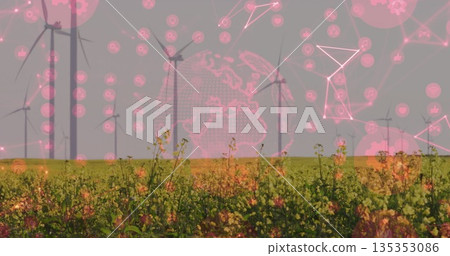 Displaying wind turbines rising over yellow field in countryside, with digital network overlay Displaying wind turbines rising over yellow field in countryside, with digital network overlay 135353086