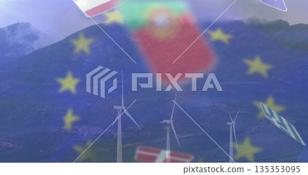 Rotating three wind turbines on hills under misty ridge, with EU stars, US China Denmark flags 135353095