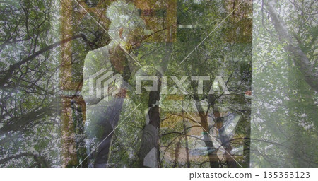 Climbing couple gripping wooden ladder and ascending tree trunk in backyard, with beams, foliage Climbing couple gripping wooden ladder and ascending tree trunk in backyard, with beams, foliage 135353123