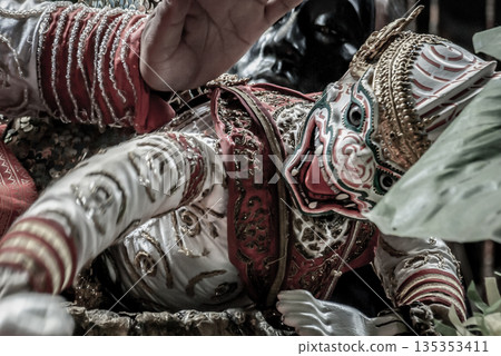 Traditional Puppet of Hanuman in Ramakien or Ramayana Story with thai puppeteers from Ramayana epic story at Baan Silapin (Artist House) in klong bang luang floating market. Traditional Puppet of Hanuman in Ramakien or Ramayana Story with thai puppeteers from Ramayana epic story at Baan Silapin (Artist House) in klong bang luang floating market. 135353411