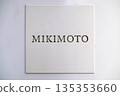 Mikimoto boutique signage on Ginza street in Tokyo, Japan 135353660