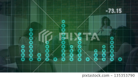 Meeting team in business casual attire discussing strategy in conference room, with laptops screen 135353790