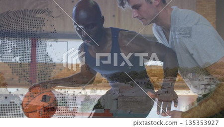 Dribbling athlete in sportswear facing defender on court in gym, with basketball and lines Dribbling athlete in sportswear facing defender on court in gym, with basketball and lines 135353927