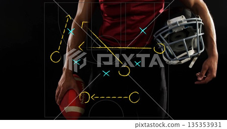 Gripping football and helmet, adult male player posing in sports studio with play diagram overlay Gripping football and helmet, adult male player posing in sports studio with play diagram overlay 135353931