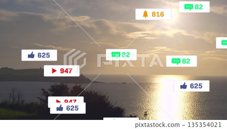 Showing sea reflecting sunlight at coast, with floating reaction icons showing 625, 947, 82 and 816 135354021