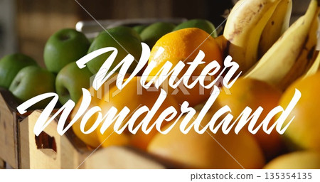 Displaying crate overflowing with oranges apples bananas in produce aisle, with Winter Wonderland 135354135