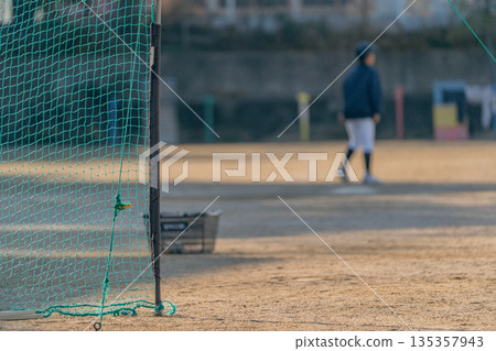 A young baseball player who is working hard to become a professional baseball player A young baseball player who is working hard to become a professional baseball player 135357943