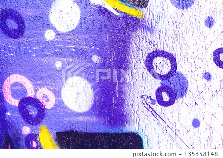 Purple Abstract Circles Graffiti on Textured Wall with Yellow and Pink Accents in 90s Neon Style 135358148