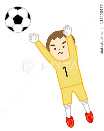 Boy goalkeeper defending in a soccer game 135358476