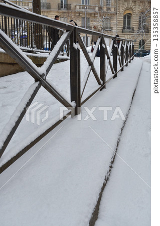 January 7, 2026: Winter in Paris, a cityscape covered in heavy snow 135358857