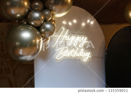 Happy Birthday Neon Sign with Silver Balloons Happy Birthday Neon Sign with Silver Balloons 135359051