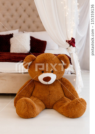 Cute Teddy Bear in Cozy Bedroom Interior 135359136