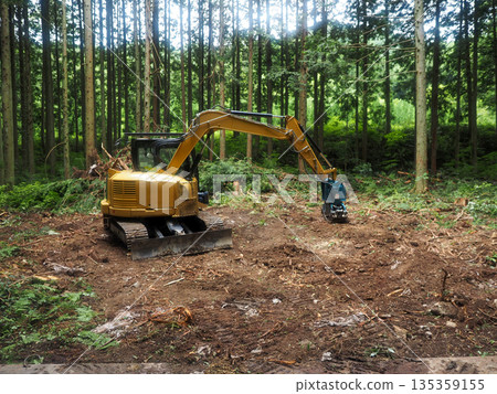 Landscape with a yellow excavator Landscape with a yellow excavator 135359155