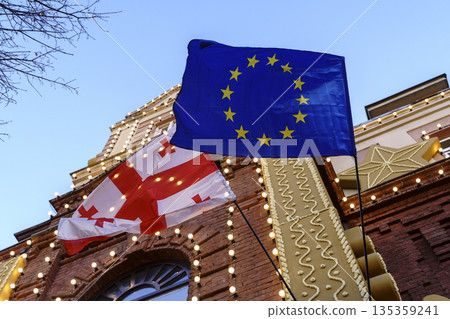 Georgia and European Union Flags Waving in Tbilisi 135359241