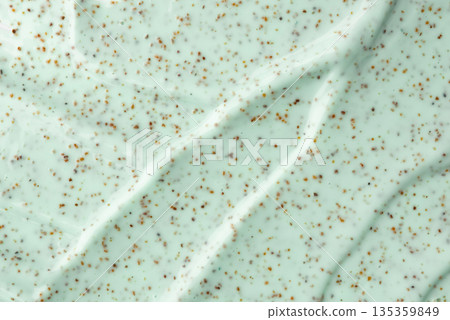 The texture of a mint body scrub with particles. Close-up The texture of a mint body scrub with particles. Close-up 135359849