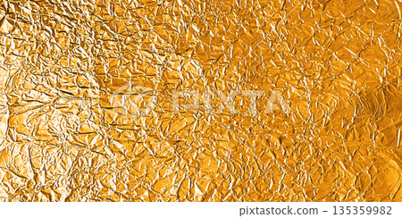 Gold foil texture with glossy crumpled surface 135359982