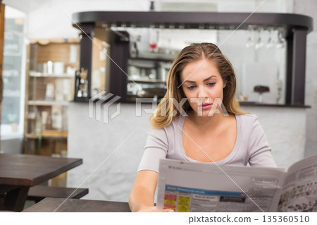 woman, newspaper, reading 135360510