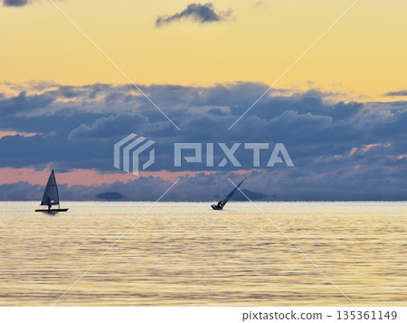 A yacht set out to see the sunrise from the deck on New Year's Day 2026 135361149