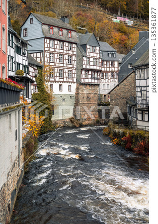 Picturesque Town Monschau with Historical Charm and the Tranquil Rur River in autumn Picturesque Town Monschau with Historical Charm and the Tranquil Rur River in autumn 135361877