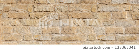 Old dry stone wall texture background showing masonry pattern Old dry stone wall texture background showing masonry pattern 135363341