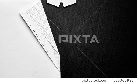 Minimal paper jacket shape with stitched edge flat lay. Minimal paper jacket shape with stitched edge flat lay. 135363983