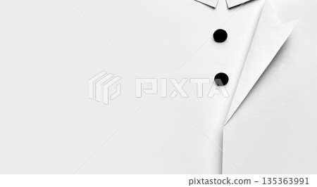 Paper shirt detail with black buttons minimalist flat lay. Paper shirt detail with black buttons minimalist flat lay. 135363991