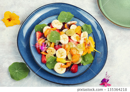 Fresh Fruit Salad on Kitchen Table 135364218