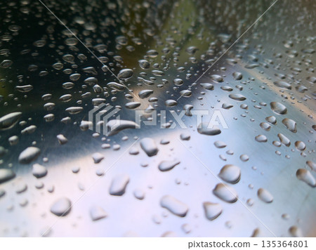 Shiny Stainless Steel Surface With Water Droplets: Closeup Macro Abstract Reflection Shiny Stainless Steel Surface With Water Droplets: Closeup Macro Abstract Reflection 135364801