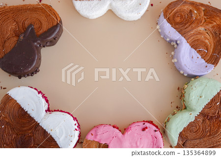 Valentine's Day flat lay top view Holiday celebration Heart shaped different variety flavor croissants on beige background with copy space. Puff pastry new trendy sweet dessert bakery. Creamy dough 135364899
