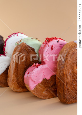 Heart shaped different variety flavor croissants on beige background with copy space. Puff pastry new trendy sweet dessert bakery. Creamy dough Heart shaped different variety flavor croissants on beige background with copy space. Puff pastry new trendy sweet dessert bakery. Creamy dough 135364974