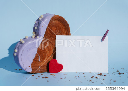 Empty paper note card template mock up Heart shaped blueberry flavor croissant on blue background with copy space. Puff pastry new trendy sweet dessert bakery. Creamy dough Empty paper note card template mock up Heart shaped blueberry flavor croissant on blue background with copy space. Puff pastry new trendy sweet dessert bakery. Creamy dough 135364994
