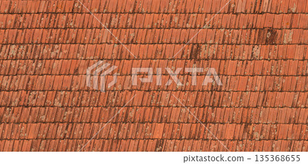 Weathered red terracotta roof tiles texture pattern 135368655