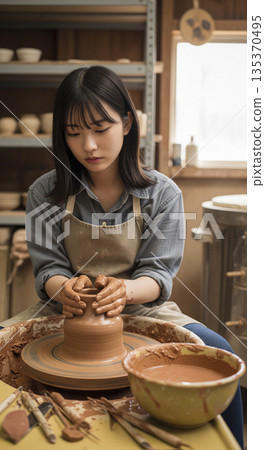 Japanese women experiencing pottery making 135370495