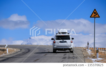 Toyota 4runner running on high altitude trail in Tibet ,China Toyota 4runner running on high altitude trail in Tibet ,China 135370625