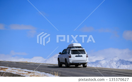 Toyota 4runner running on high altitude trail in Tibet ,China Toyota 4runner running on high altitude trail in Tibet ,China 135370627