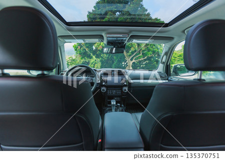 Interior of new off road car in forest mountains Interior of new off road car in forest mountains 135370751