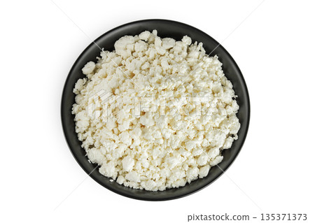 Cottage Cheese, Curd in ceramic bowl isolated on white background. Top view. Flat lay Cottage Cheese, Curd in ceramic bowl isolated on white background. Top view. Flat lay 135371373