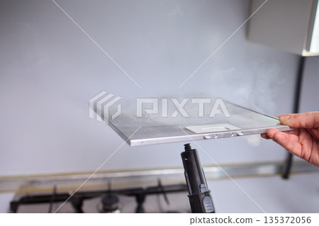 Utilizing Steam Cleaning Techniques on Kitchen Hood Filters for Effective Deep Cleaning Tasks 135372056