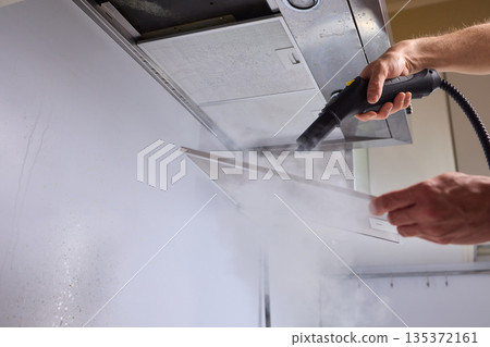 Utilizing Steam Cleaning Techniques on Kitchen Hood Filters for Effective Deep Cleaning Tasks 135372161