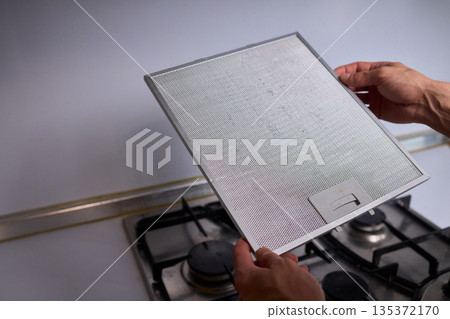 Utilizing Steam Cleaning Techniques on Kitchen Hood Filters for Effective Deep Cleaning Tasks 135372170