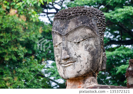 Ancient stone Buddha images in Kamphaeng Phet Historical Park, Kamphaeng Phet Province Thailand Ancient stone Buddha images in Kamphaeng Phet Historical Park, Kamphaeng Phet Province Thailand 135372321