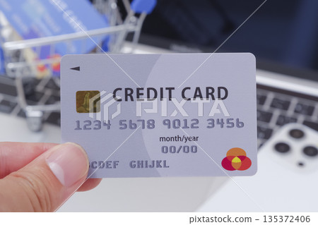 Credit card and computer Credit card and computer 135372406