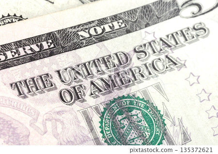 Currency of the United States is shown in clear detail on a five-dollar bill Currency of the United States is shown in clear detail on a five-dollar bill 135372621