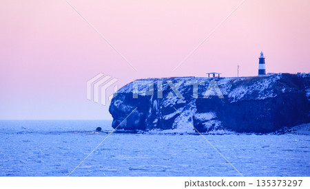 Drift ice abuts Cape Notoro on the Sea of Okhotsk in Abashiri, Hokkaido, before dawn 135373297