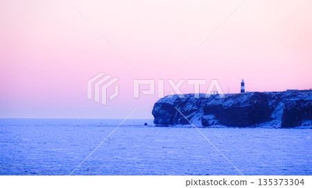 Drift ice abuts Cape Notoro on the Sea of Okhotsk in Abashiri, Hokkaido, before dawn 135373304