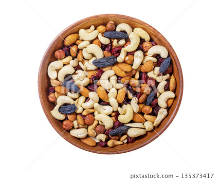 Plate of mixed nuts isolated on white background Plate of mixed nuts isolated on white background 135373417