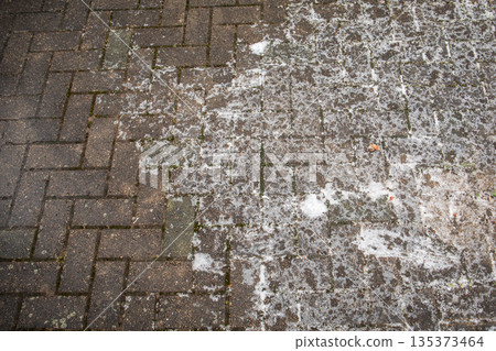 Icy Brick Pavement Surface Showing Frost and Winter Slippery Conditions Icy Brick Pavement Surface Showing Frost and Winter Slippery Conditions 135373464